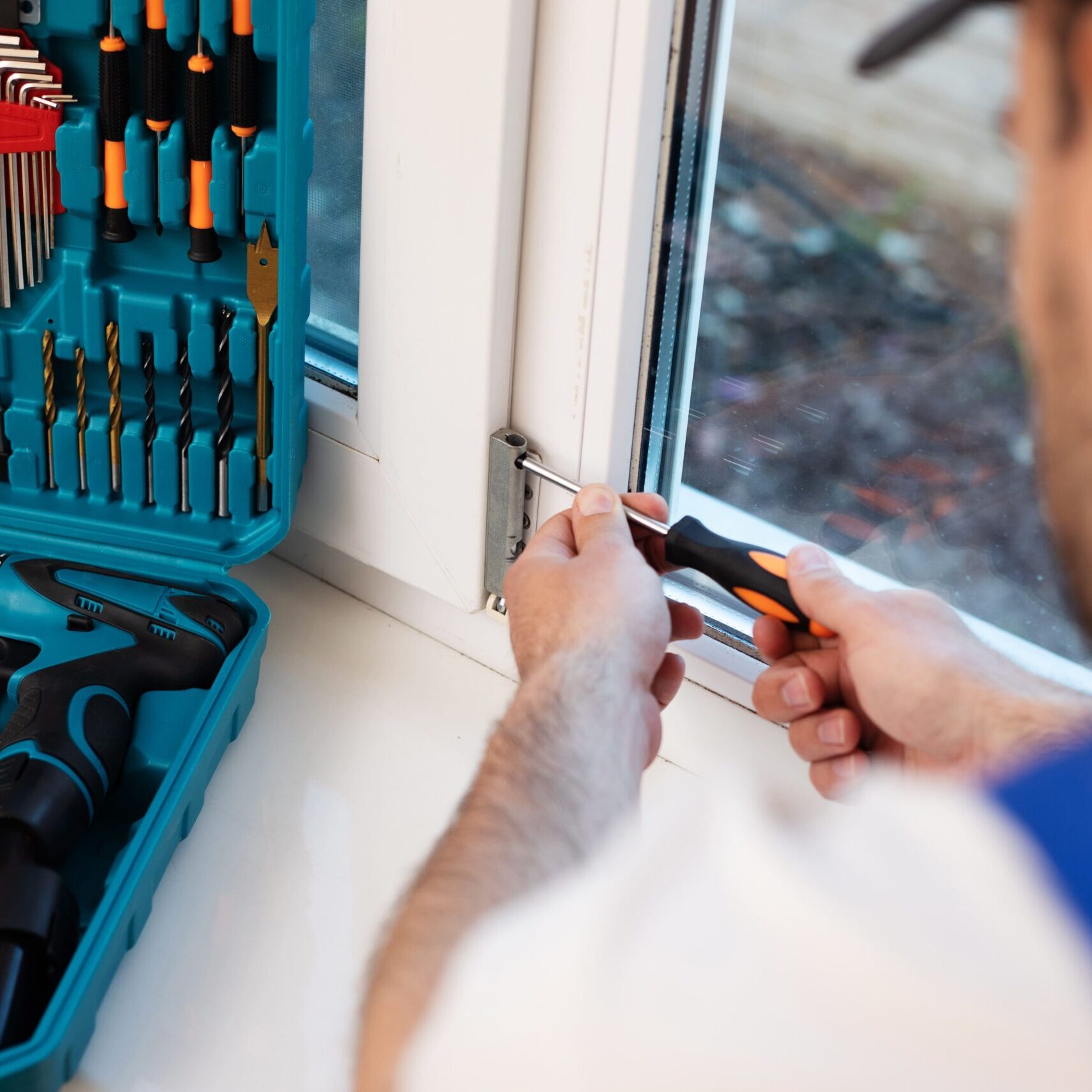 Young Professional Worker Man Uniform Suit Is Installing Window With Help Tools Young Professional Worker Man Uniform Suit Is Installing Window With Help Tools